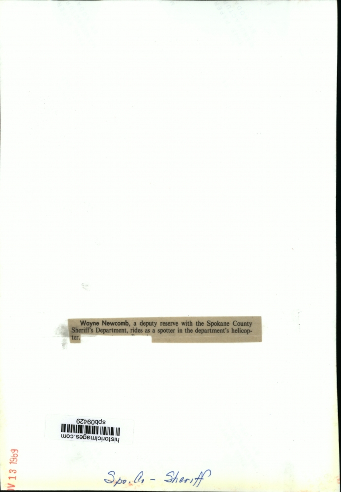 1989 Wayne deputy with Co. Sheriff's dept. rides helicopter Historic Images